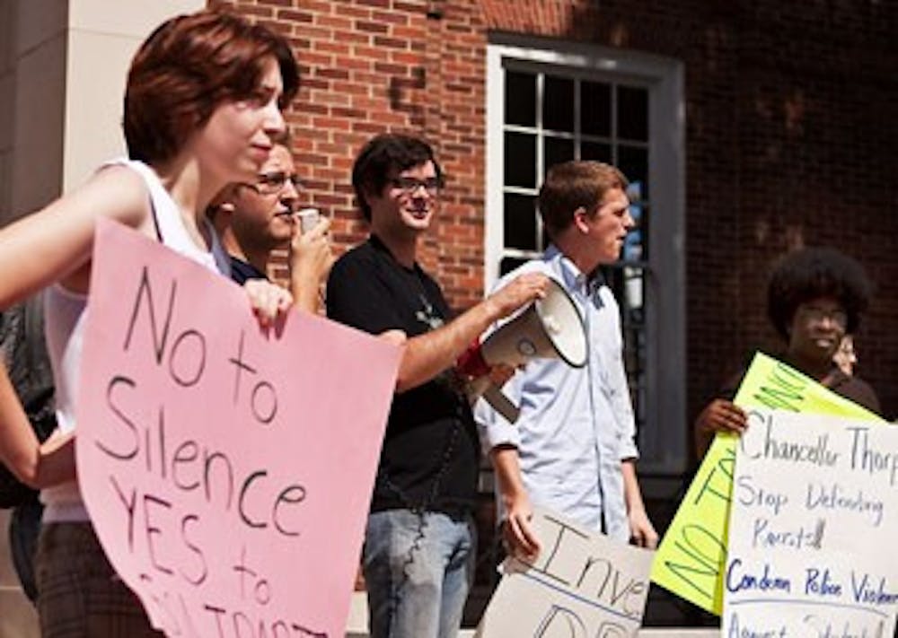 Students from the UNC Protesters’ Defense Committee rally outside Orange County District Court.