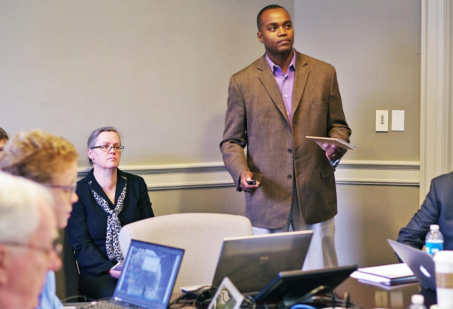 Associate Professor at North Carolina Central University Antonio Baines (right), speaks at the Faculty Executive meeting on Monday.