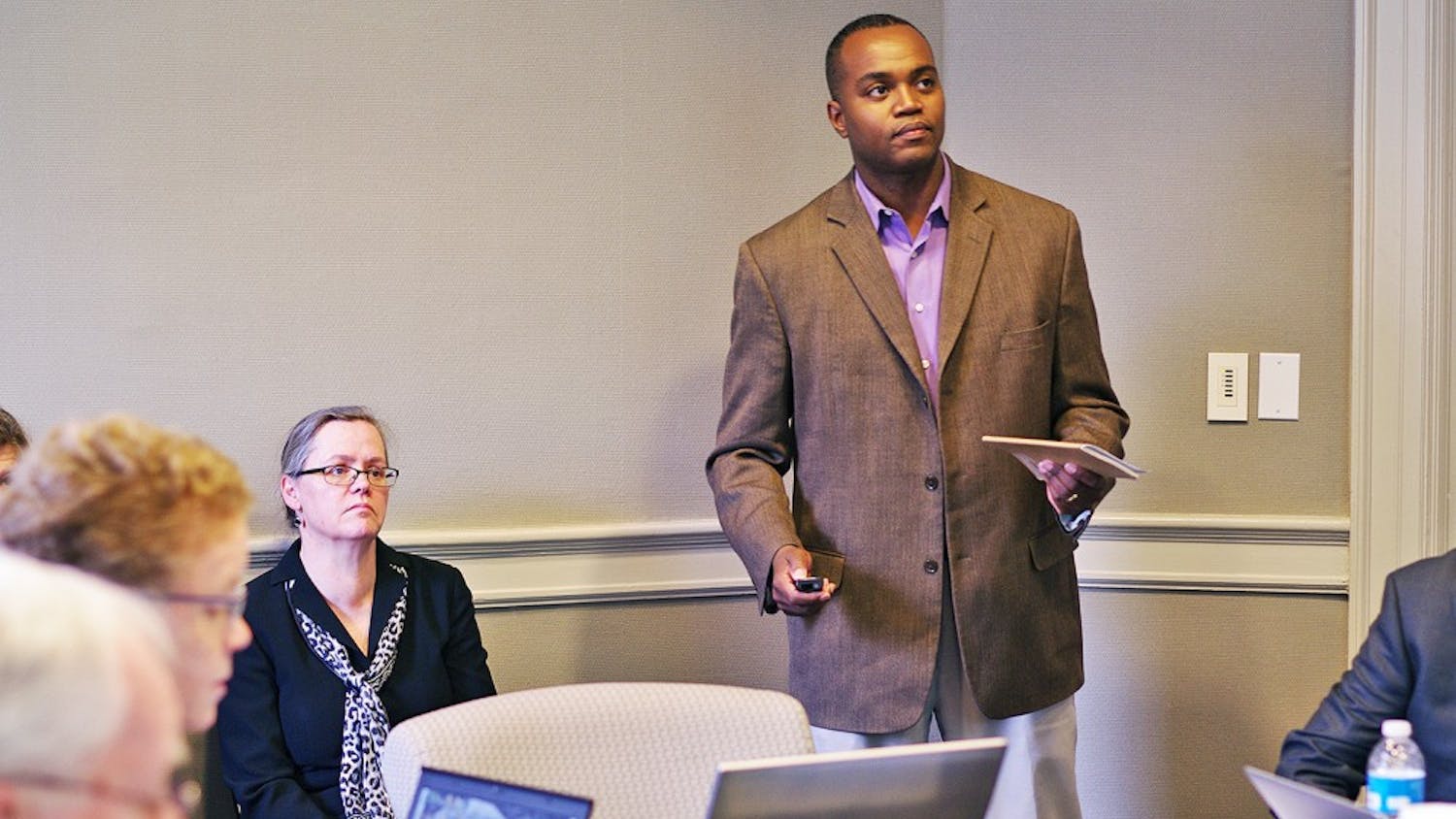 Associate Professor at North Carolina Central University Antonio Baines (right), speaks at the Faculty Executive meeting on Monday.
