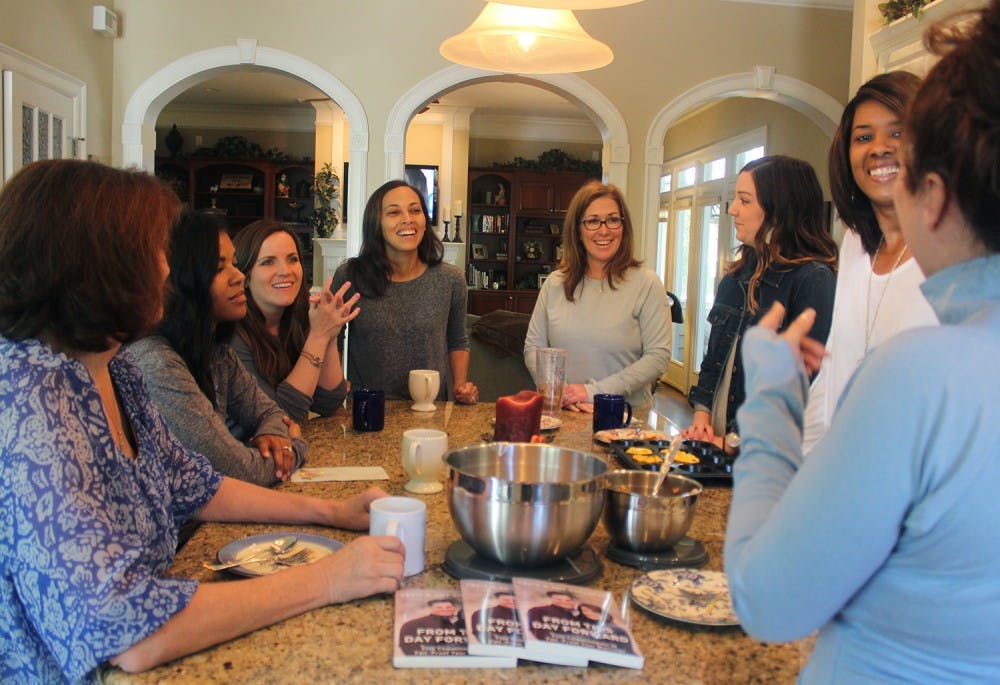 The wives of almost all the head coaches of UNC's sports teams meet weekly for breakfast and bible study.