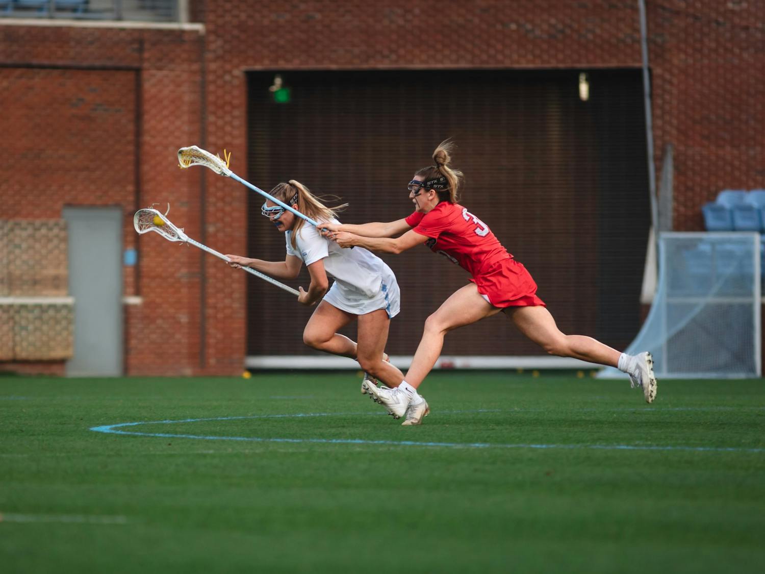 UNC senior defender Emily Nalls (1) is pictured with the ball during the women's lacrosse game against Liberty on Wednesday, Feb. 15, 2023, at Dorrance Field. UNC beat Liberty 18-6.