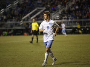 Junior forward Jack Skahan (8) jogs during the game against Duke on Tuesday, Oct. 23, 2018 in Koskinen Stadium. Skahan scored the lone goal for UNC to clench the ACC Coastal Division Title.