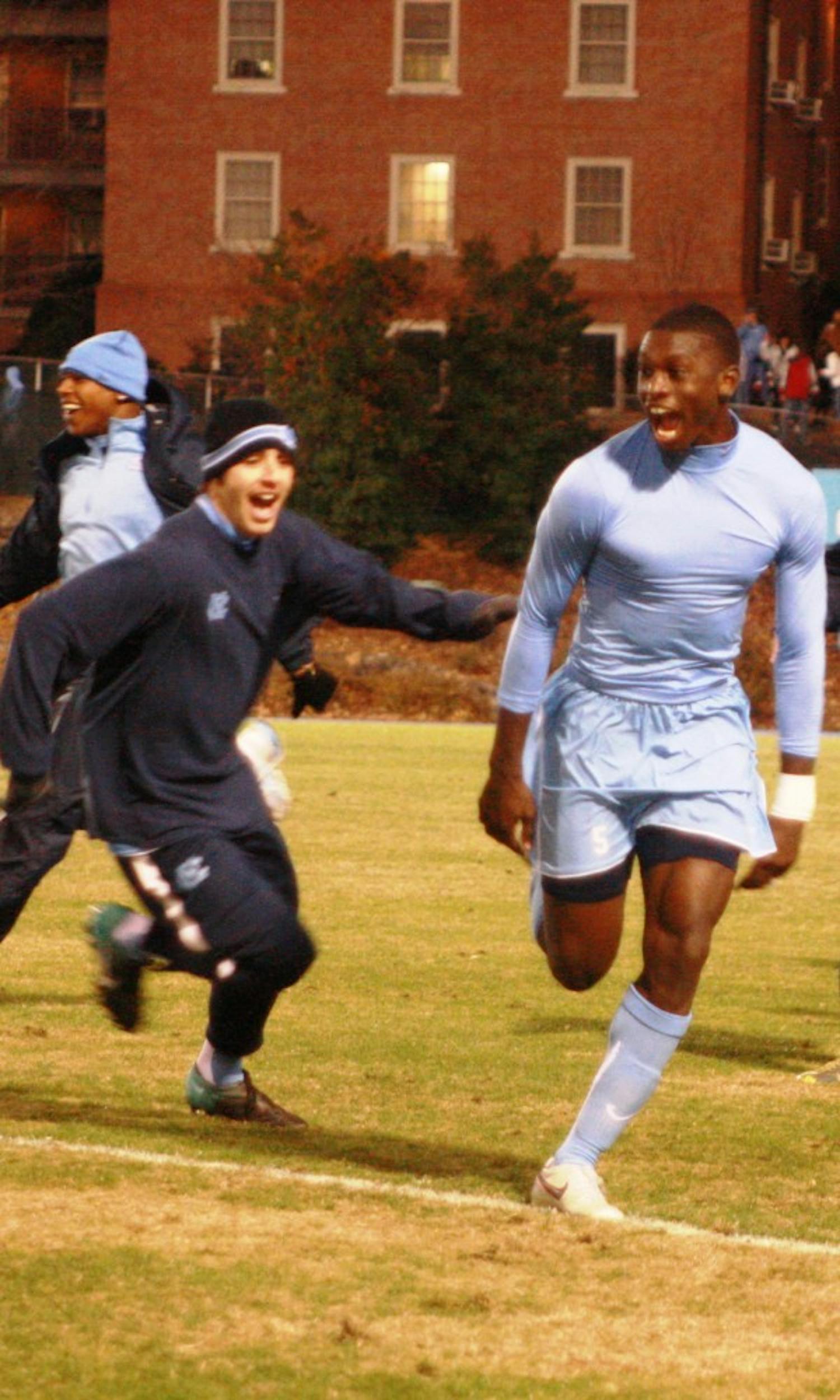 Senior transfer Jalil Anibaba celebrates making North Carolina’s fourth and final penalty kick by taking off around the field. Anibaba will make his first appearance in UNC’s third consecutive College Cup in California.