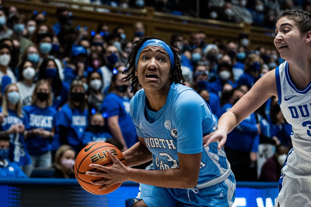Kennedy Todd-Williams (3) drives to the basket at the game against Duke in the Cameron Indoor Stadium on Thursday, Jan. 17, 2022. UNC won 78-62.