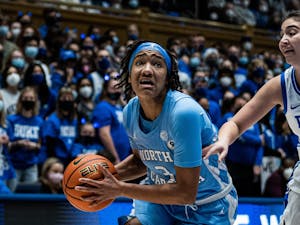Kennedy Todd-Williams (3) drives to the basket at the game against Duke in the Cameron Indoor Stadium on Thursday, Jan. 17, 2022. UNC won 78-62.