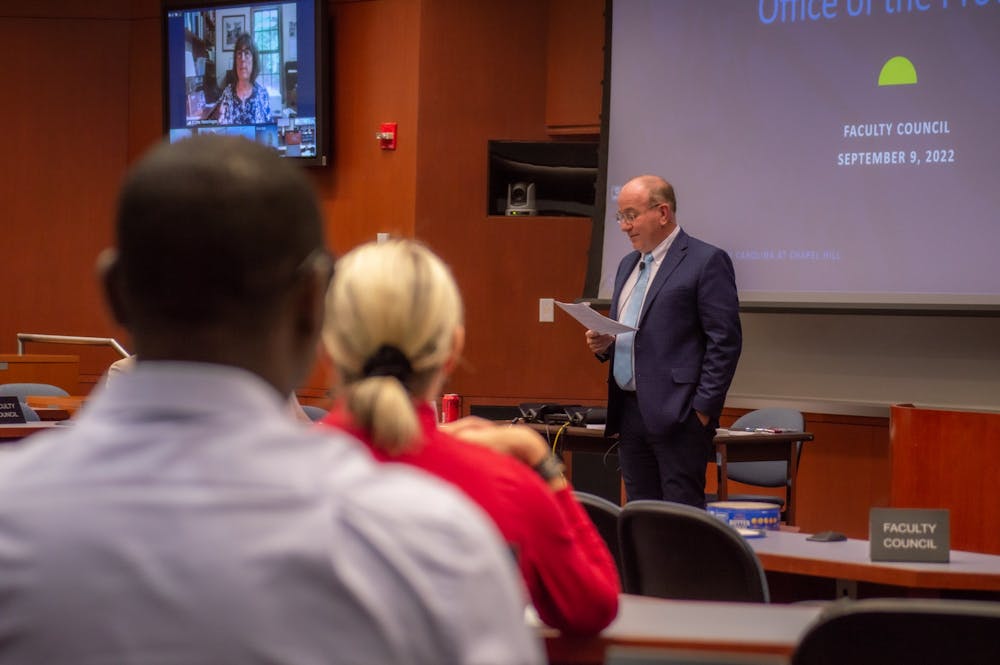 UNC's provost, Chris Clemmons, speaks at the beginning of Friday's Faculty Council meeting on Sept. 9, 2022 in Karr Hall.