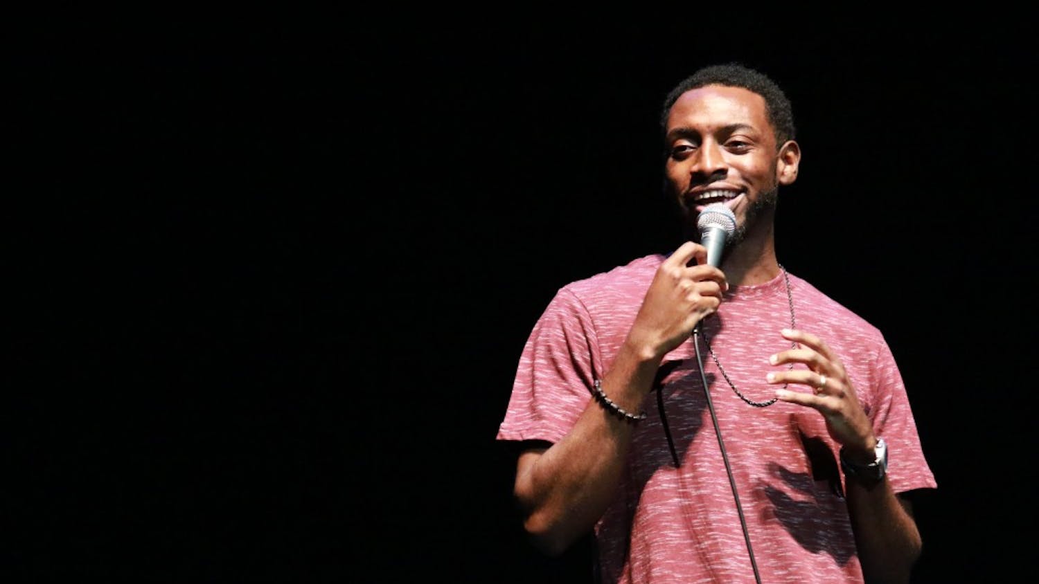 Opener AJ Foster performs stand-up during the Homecoming Comedy Show Tuesday night in Memorial Hall. 