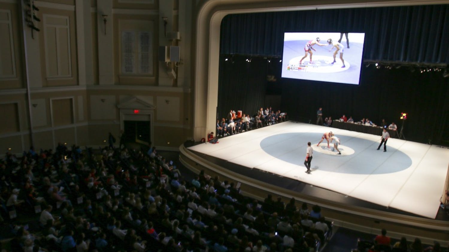 UNC wrestling squared off against NC State in the "Brawl at the Hall" on Monday night. The match took place on the stage in Memorial Hall.
