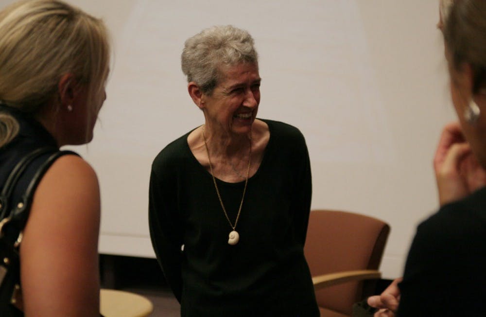 Aldwyth answers questions about her art from guests Tuesday  evening after giving a free lecture at the Hanes Art Center. 