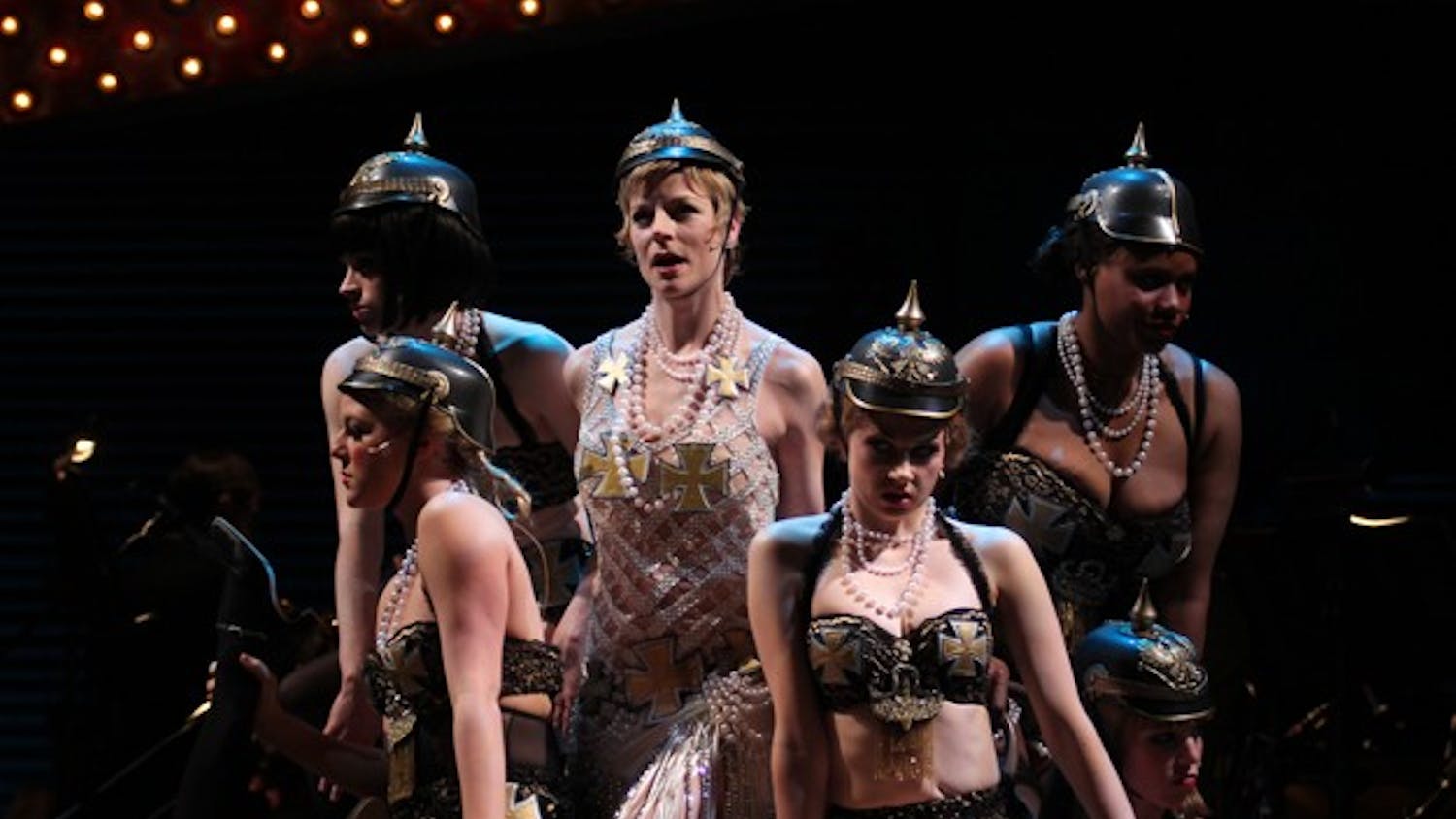 Lisa Brescia (center) performs in Playmakers' Cabaret as Sally Bowles performing the number "Mein Herr" with members of the cast.