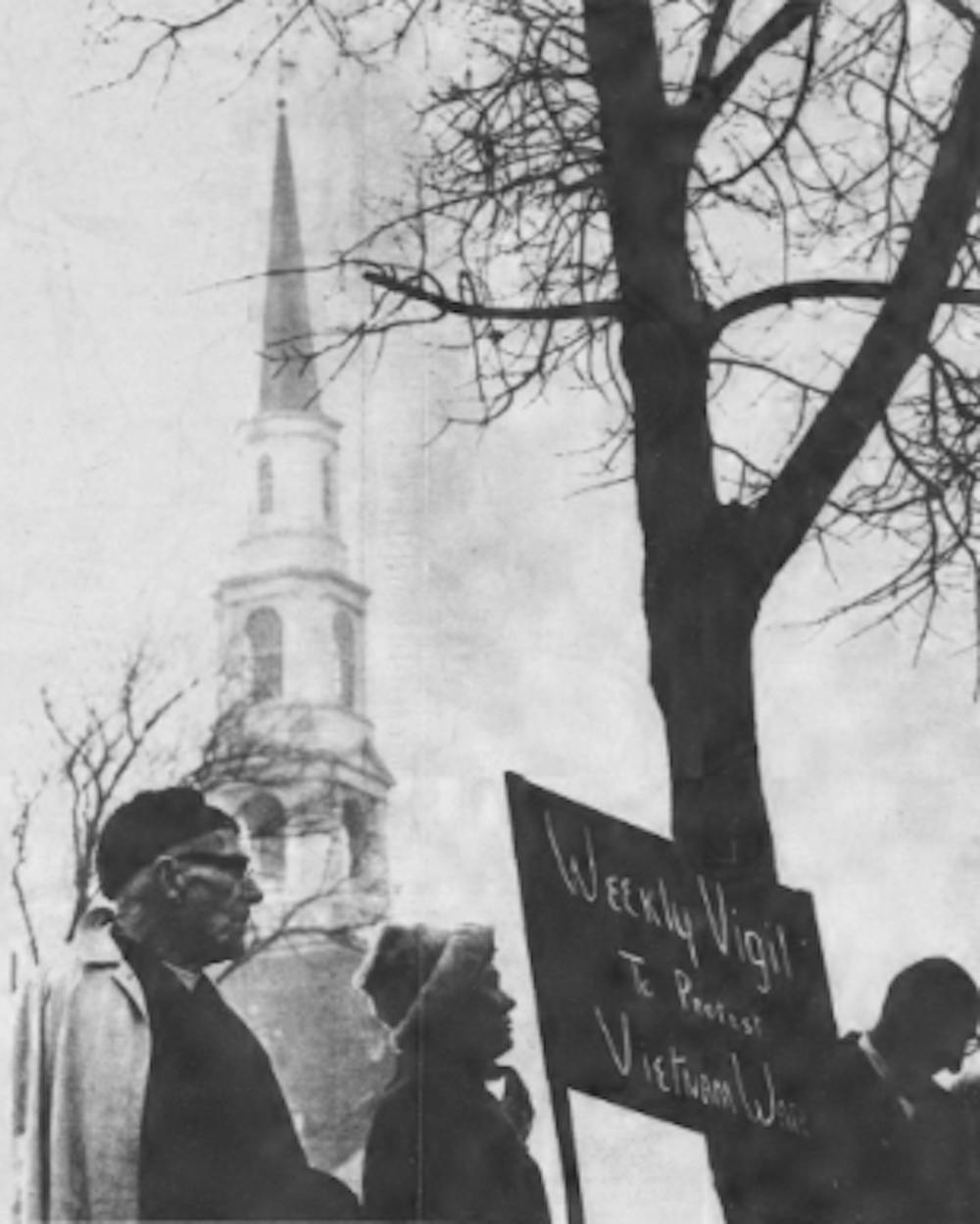 DTH Archive, Jan. 5, 1967. The first weekly peace watch was held yesterday afternoon with up to 100 to 150 protestors in attendance. Photo by Jock Lauterer.