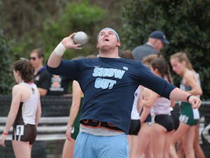 Sophomore Daniel McArthur throws the shot put at the Raleigh Relays on March 30.
