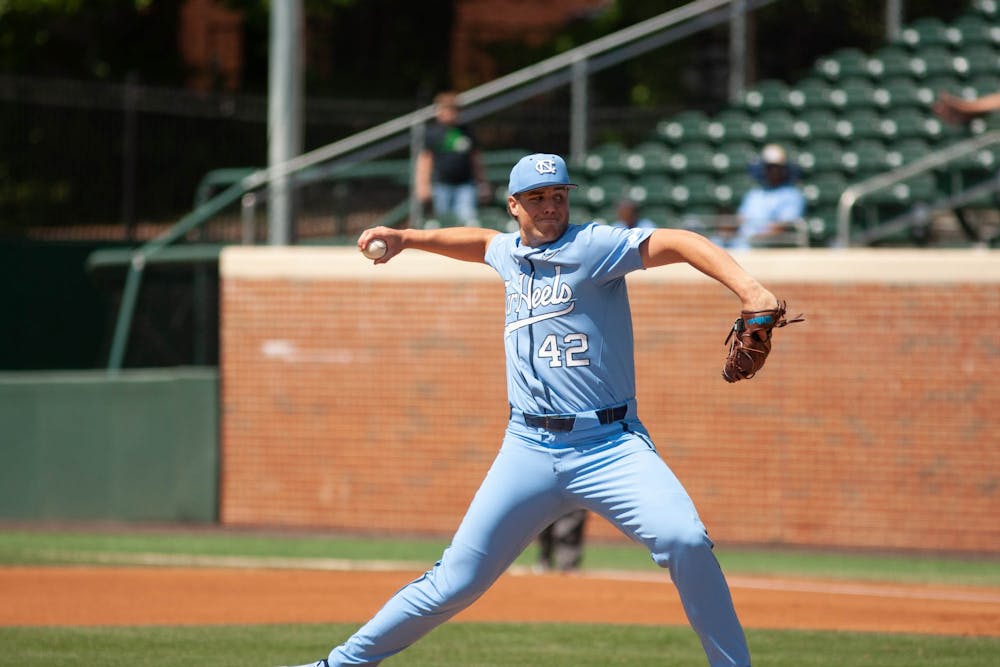 Junior right-handed pitcher Jake Knapp (42) pitches the ball during the baseball game against Boston College on Sunday, April 23, 2023, at Boshamer Stadium. UNC fell to Boston College 2-6.