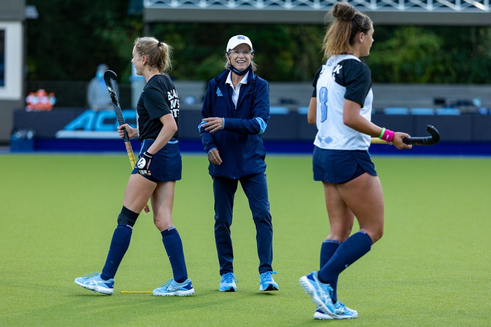 UNC head coach Karen Shelton talks to her players during warmups before UNC plays Boston College in Karen Shelton Stadium Nov. 5, 2020. The Tar Heels beat the Eagles 4-0 in the first round of the ACC playoffs, securing Shelton’s 700th win.