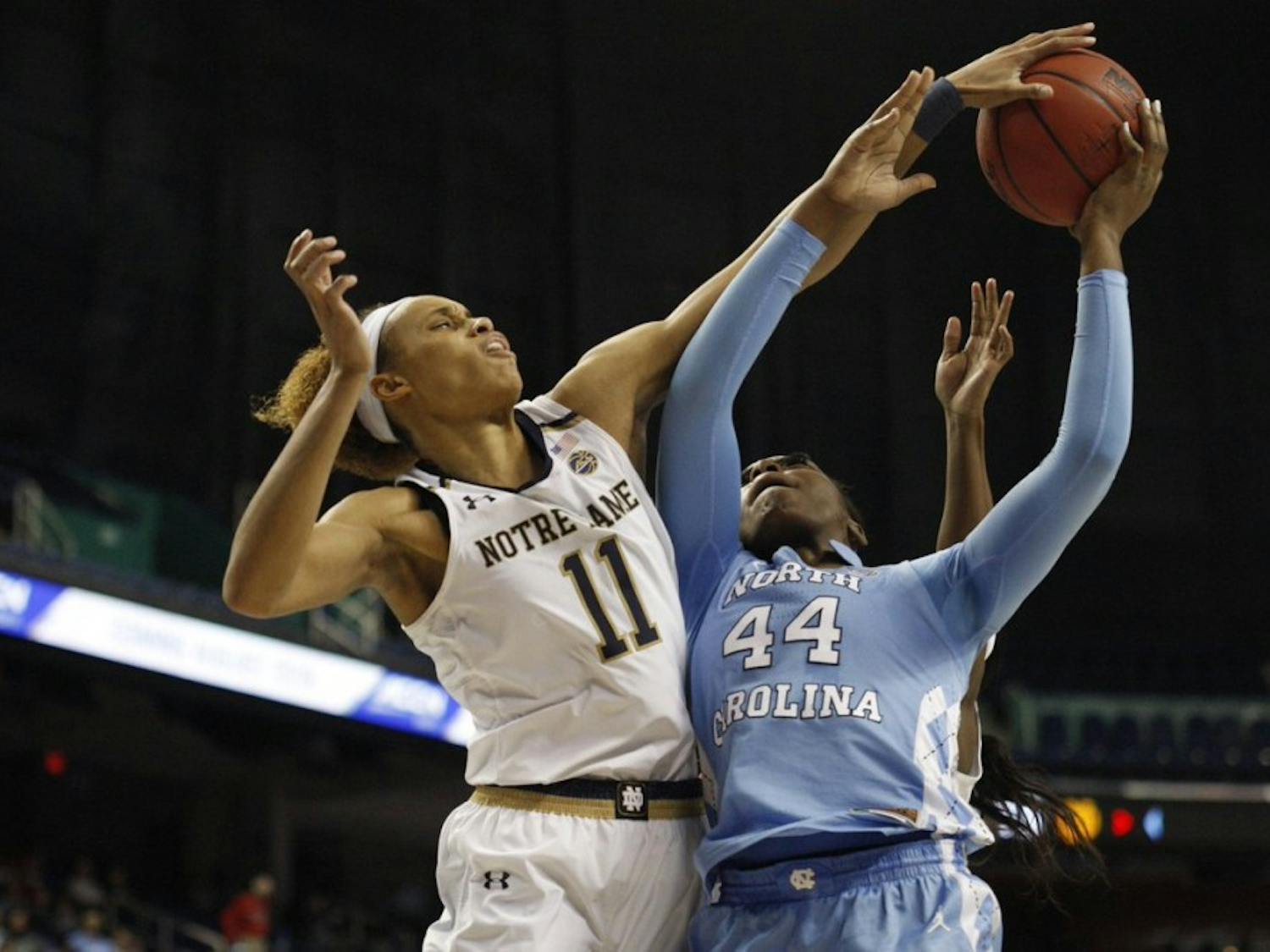 North Carolina sophomore forward Janelle Bailey goes up for a shot against Notre Dame forward Briana Turner in an ACC Tournament second-round matchup on March 8, 2019.