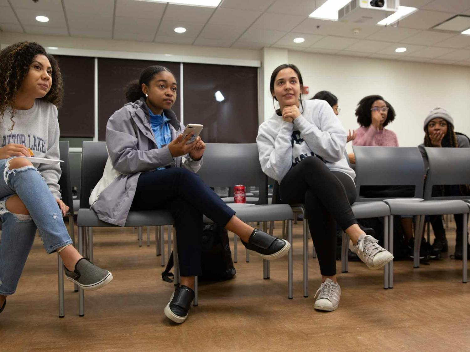 Members of The Bridge play Kahoot! on Thursday, March 5, 2020 during their fourth anniversary. The Bridge serves as a safe pace for many women of color on campus.