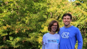 Ben Gleiter and his mother Kathleen pose together ahead of Ben's 40-mile ride with the Bike Box Project and Moving Day.
