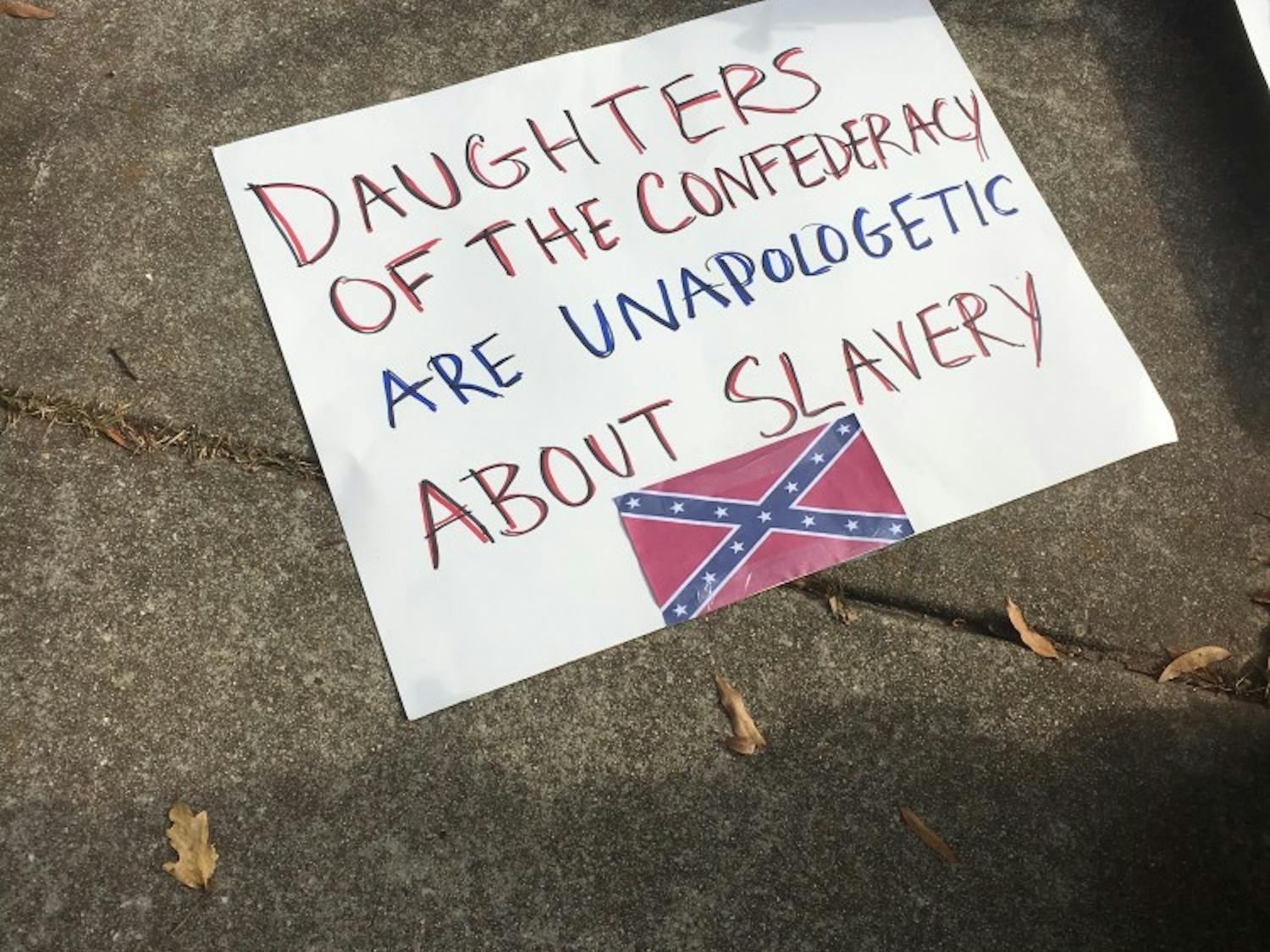 A sign made by a Hillsborough Progressives Taking Action activist in protest of the United Daughters of the Confederacy.