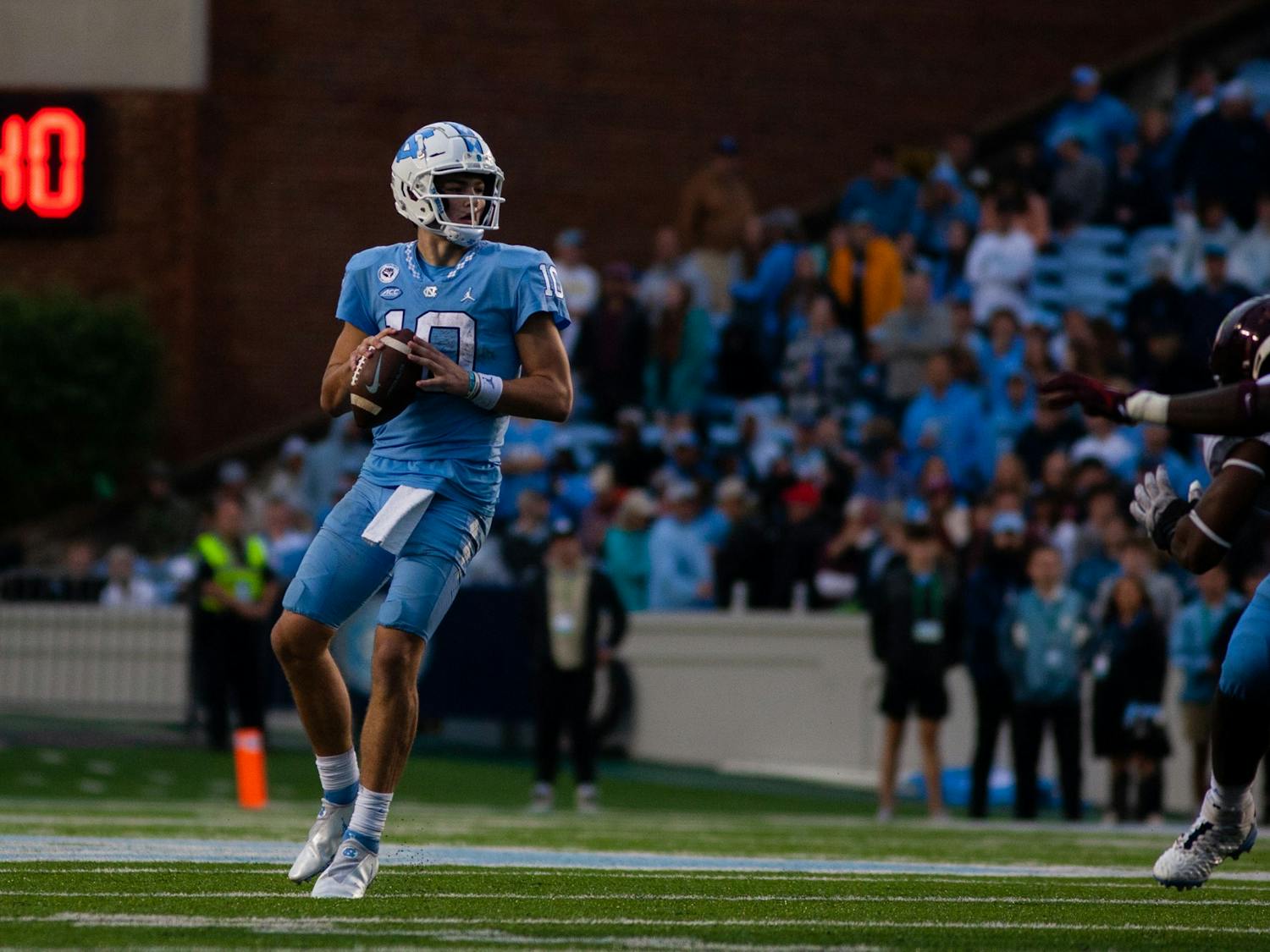UNC first-year quarterback Drake Maye (10) looks for a receiver during a home football game at Kenan Stadium against Virginia Tech on Saturday, Oct. 1, 2022. UNC won 41-10.
