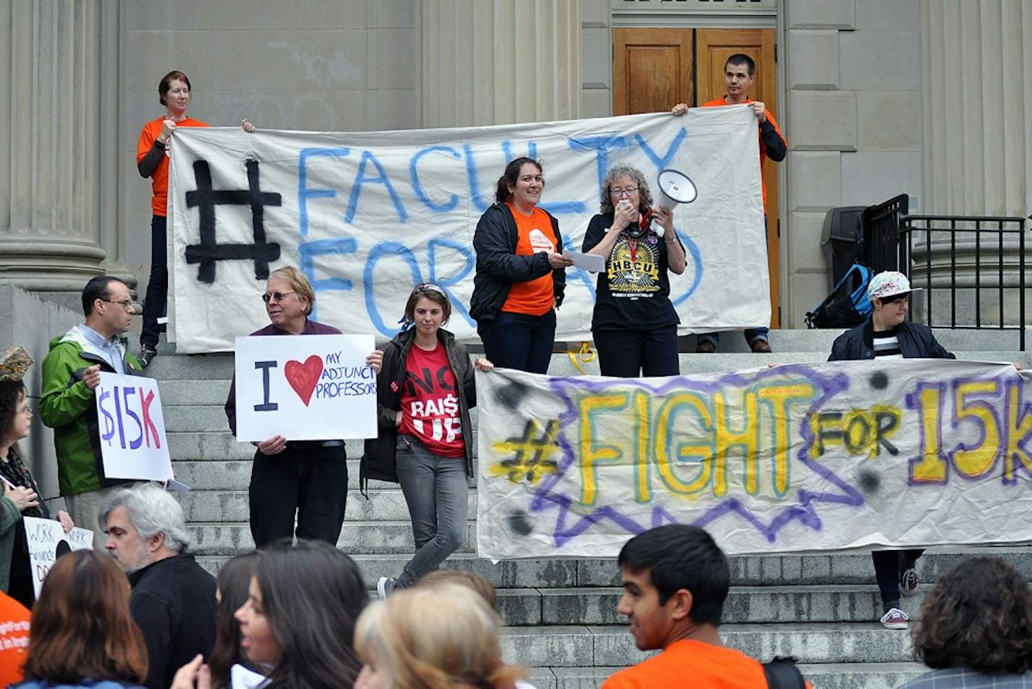 Students and faculty gathered to rally on the steps of Wilson Library on Wednesday. 