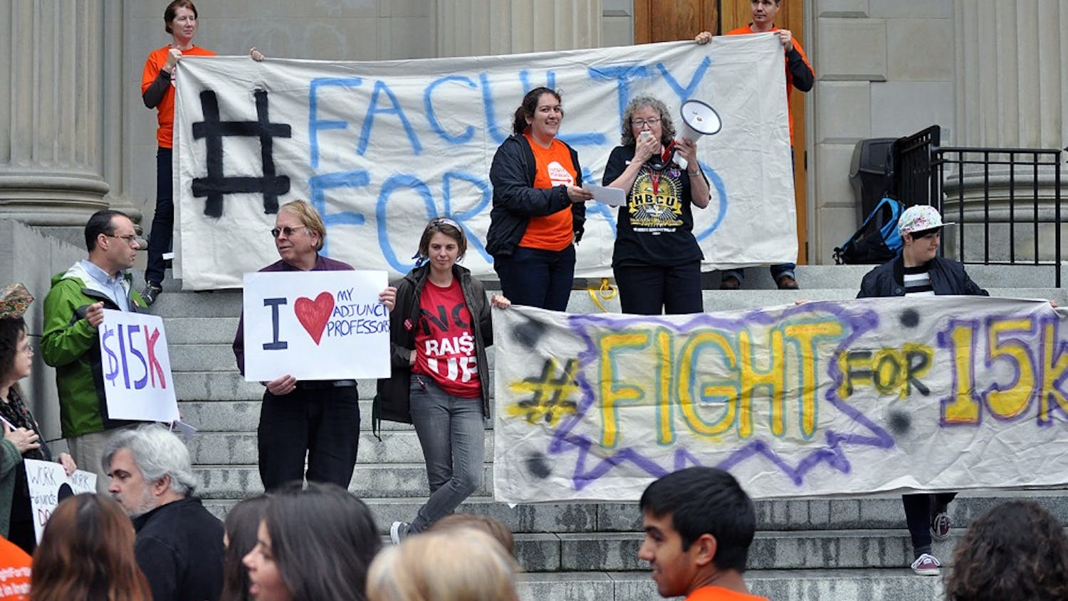 Students and faculty gathered to rally on the steps of Wilson Library on Wednesday. 