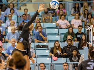 UNC freshman outside hitter Lauren Harrison (25) spikes the ball during the Tar Heels' 3-0 win against the Boston College Eagles on Sunday, Oct. 27, 2019 in Carmichael Arena in Chapel Hill. UNC beat Boston College 3-0.&nbsp;