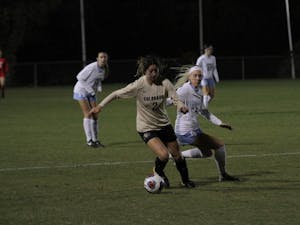 Forward Bridgette Andrzejewski fights for the ball against Colorado in an NCAA Tournament second round match on Friday in WakeMed Soccer Park in Cary.&nbsp;