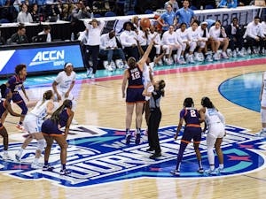 Junior forward Anya Poole (31) tips off the game against Clemson University in the second round of the ACC Championship in Greensboro, NC.