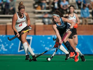 Sophomore forward Erin Matson (1) dribbles the ball towards the goal during the NCAA Championship Game against Princeton University at Kentner Stadium on Sunday, Nov. 24, 2019. UNC won 6-1, marking their 8th national championship.