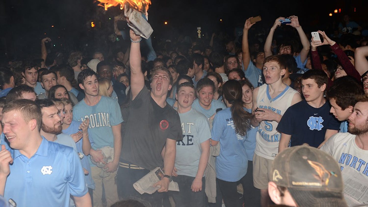 	UNC students celebrate the win after the men&#8217;s basketball team defeated Duke University on Thursday Feb. 20.