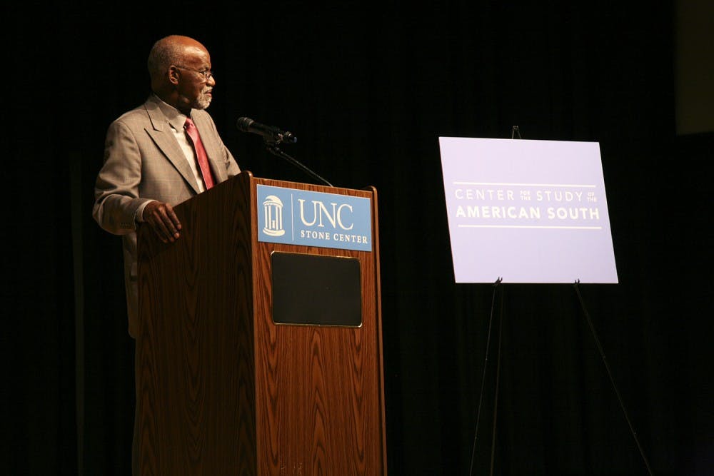 James E. Ferguson II speaks to students, professors, and Carolina Alumni in the Stone Center theater on Tuesday night. Ferguson focuses his lecture on the Voting Rights Act and its implementation over the past fifty years. He also discusses the topic of race in the American south and how "everything is different, but not much has changed."