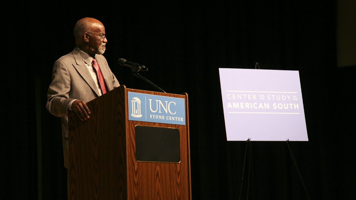 James E. Ferguson II speaks to students, professors, and Carolina Alumni in the Stone Center theater on Tuesday night. Ferguson focuses his lecture on the Voting Rights Act and its implementation over the past fifty years. He also discusses the topic of race in the American south and how "everything is different, but not much has changed."