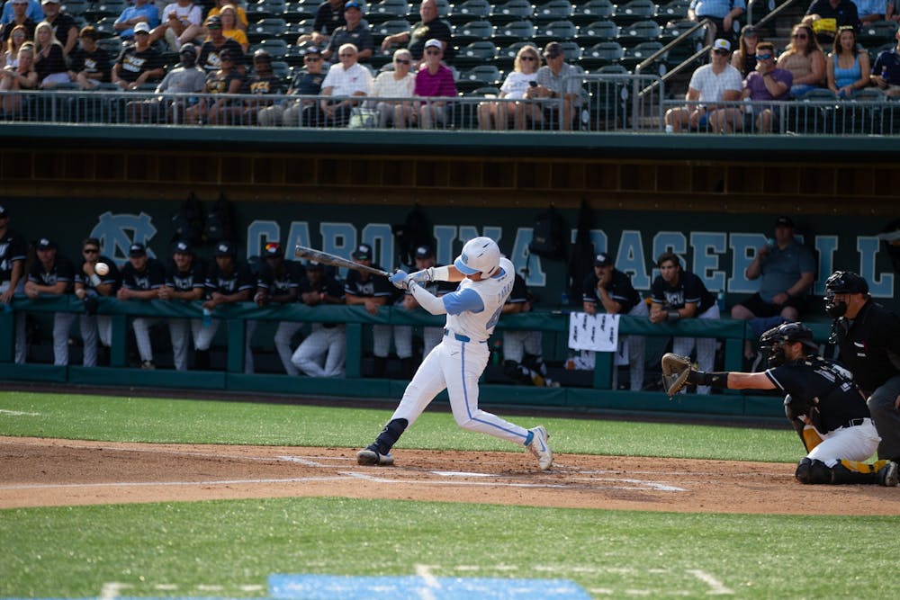 Junior outfielder Angel Zarate (40) hits the ball during UNC's NCAA Regional game against VCU at Boshamer Stadium on June 5, 2022. UNC won 19-8.