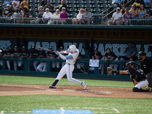 Junior outfielder Angel Zarate (40) hits the ball during UNC's NCAA Regional game against VCU at Boshamer Stadium on June 5, 2022. UNC won 19-8.