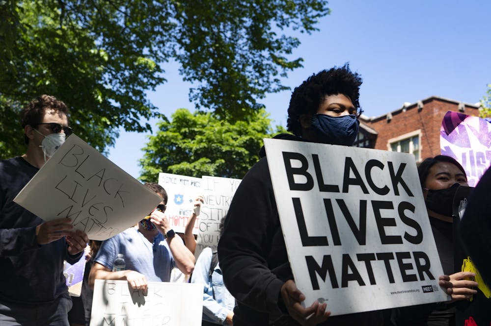 <p>Students in Evanston, IL join countless other cities around the nation in support of the Black Lives Matter movement by protesting against George Floyd's death and other recent tragedies on Sunday, May 31, 2020.</p>