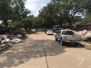 A residential street in Houston, TX during the cleanup process after Hurricane Harvey. Photo courtesy of &nbsp;Valerie Mueller.