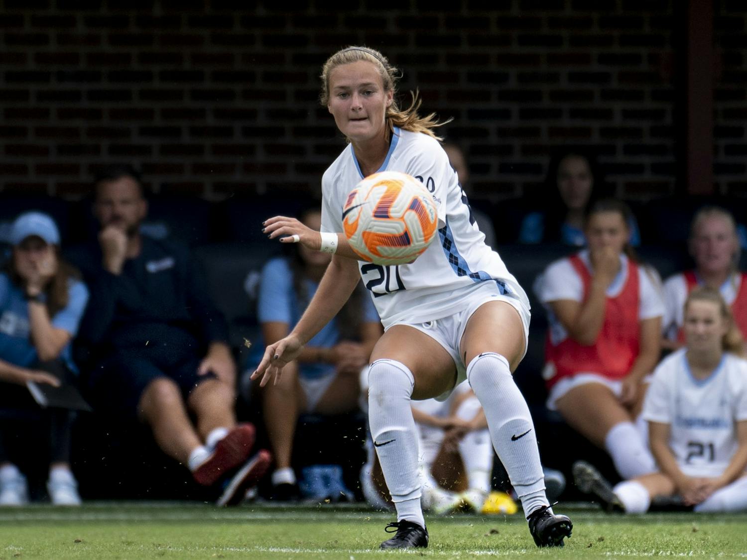 Senior midfielder Libby Moore (20) handles the ball at the UNC women’s soccer game against Boston College at Dorrance Field on Sunday, Sept. 25, 2022. UNC won 3-0.