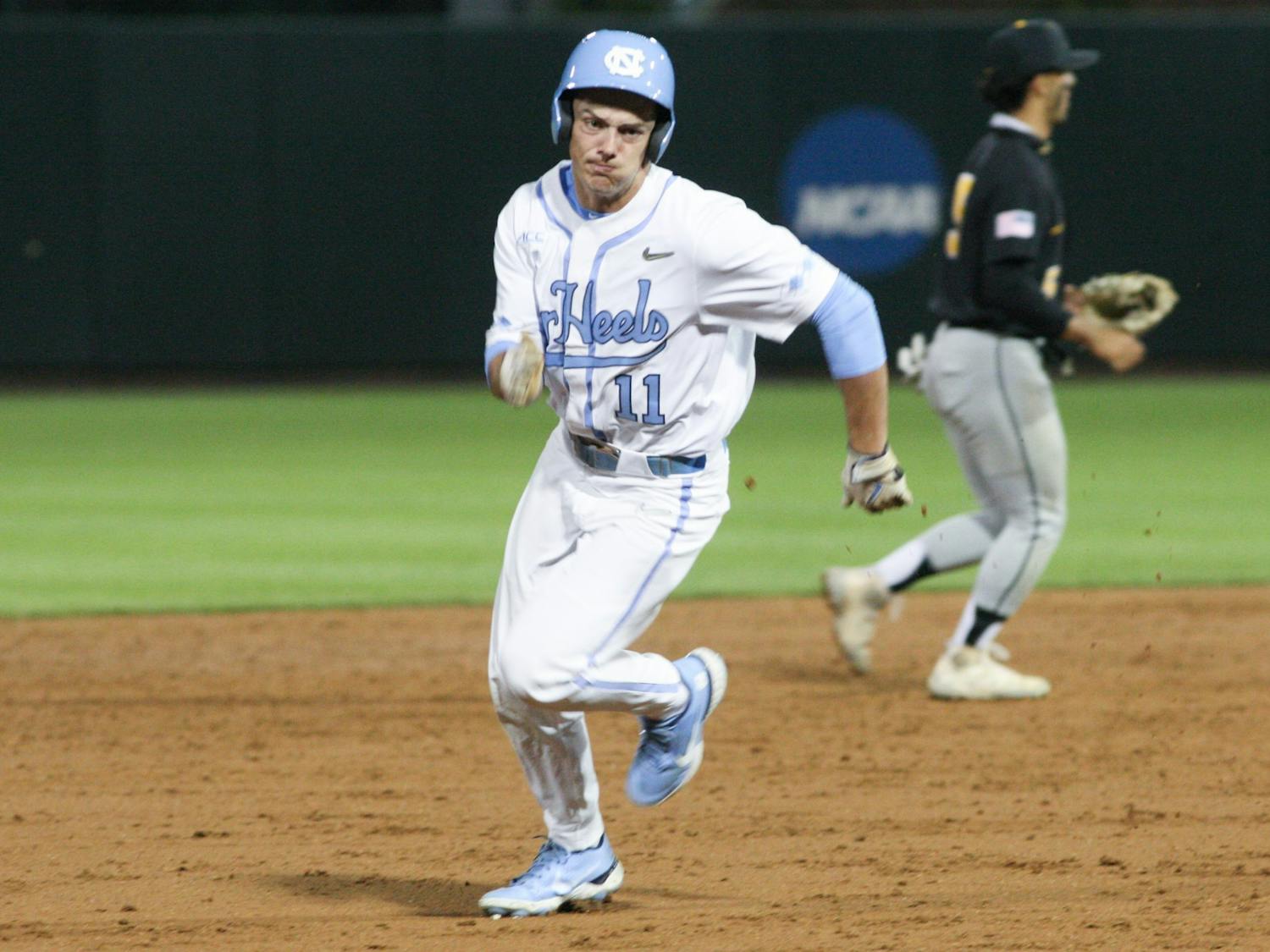 UNC freshman outfielder Reece Holbrook (11) runs towards third base during a home game at Boshamer Stadium against Appalachian State on Tuesday, March 22, 2022.