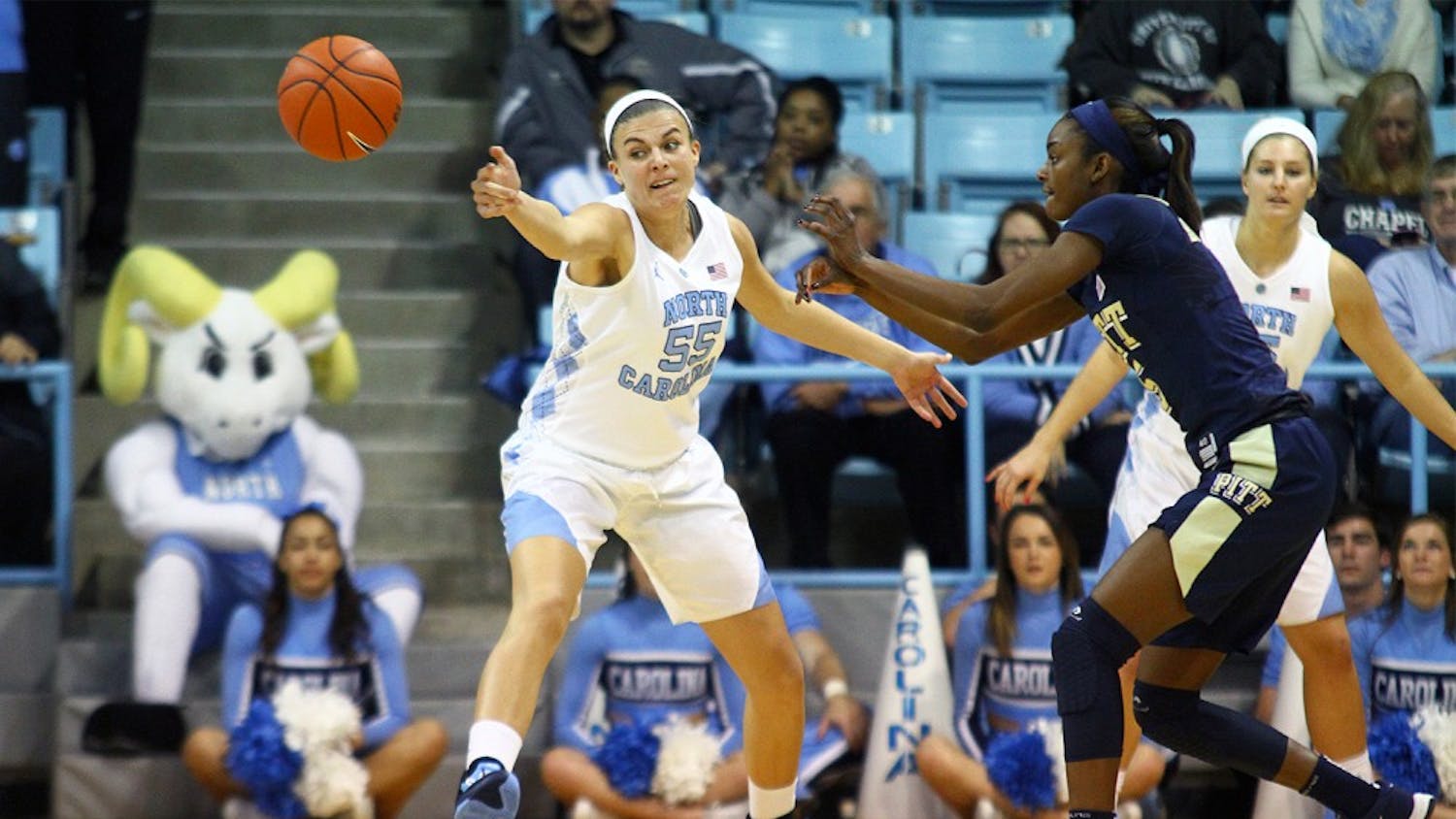 Forward Paige Neuenfeldt (55) deflects the ball in her first game as a Tar Heel in UNC Women's basketball's blowout loss to Pittsburgh on Thursday.