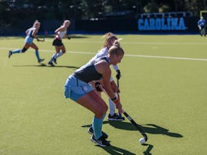 Catherine Hayden (UNC #8) defends the ball from Caroline Hanan (Duke #2) during the game on Sunday, Oct. 21 2018. Hayden scored the first goal of the second half, helping the Tar Heels to a 5-2 victory over Duke.