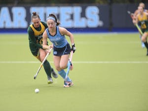 UNC forward Erin Matson (1) competes for the ball against William and Mary midfielder Ashleigh Nottingham (10) during the first round of the NCAA Tournament at Karen Shelton Stadium on Friday. UNC won 4-0. 