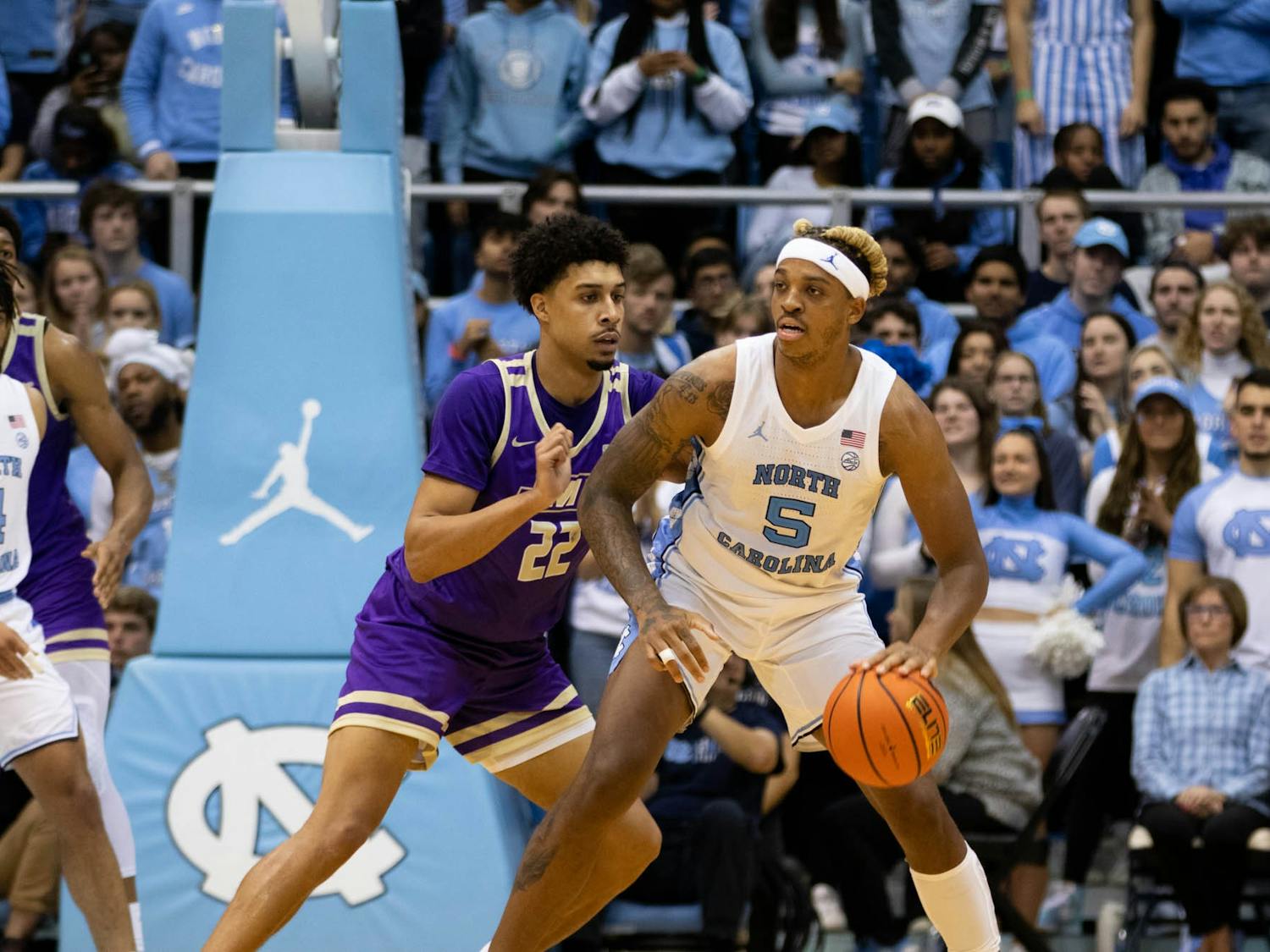 UNC senior Armando Bacot (5) looks to pass during the men's basketball game on Sunday, Nov. 20, 2022, at the Dean Smith Center. UNC beat JMU 80-64.