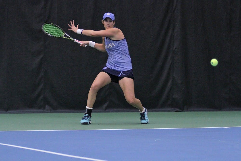Senior Hayley Carter  prepares to return a volley in her singles match against Duke on  Wednesday. 