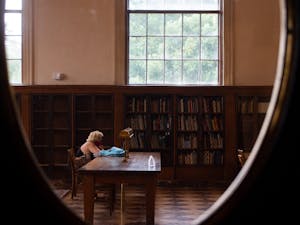 Students return to UNC-Chapel Hill's Libraries before the start of the fall semester. The system has changed its building hours, added self-service checkout stations, and it has reduced overdue book fees.