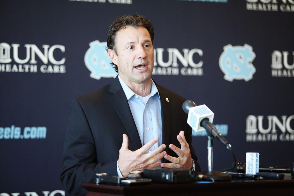 Head Football coach Larry Fedora speaks at National Signing Day in Kenan Stadium Wednesday.  