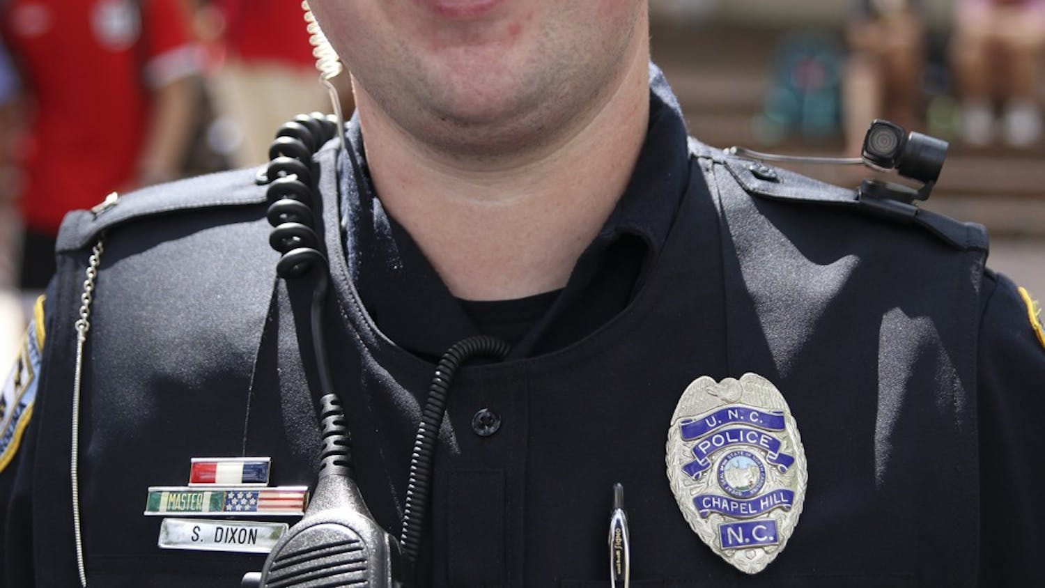 Officer S. Dixon wears a body camera on his left shoulder in the Pit on Wednesday.