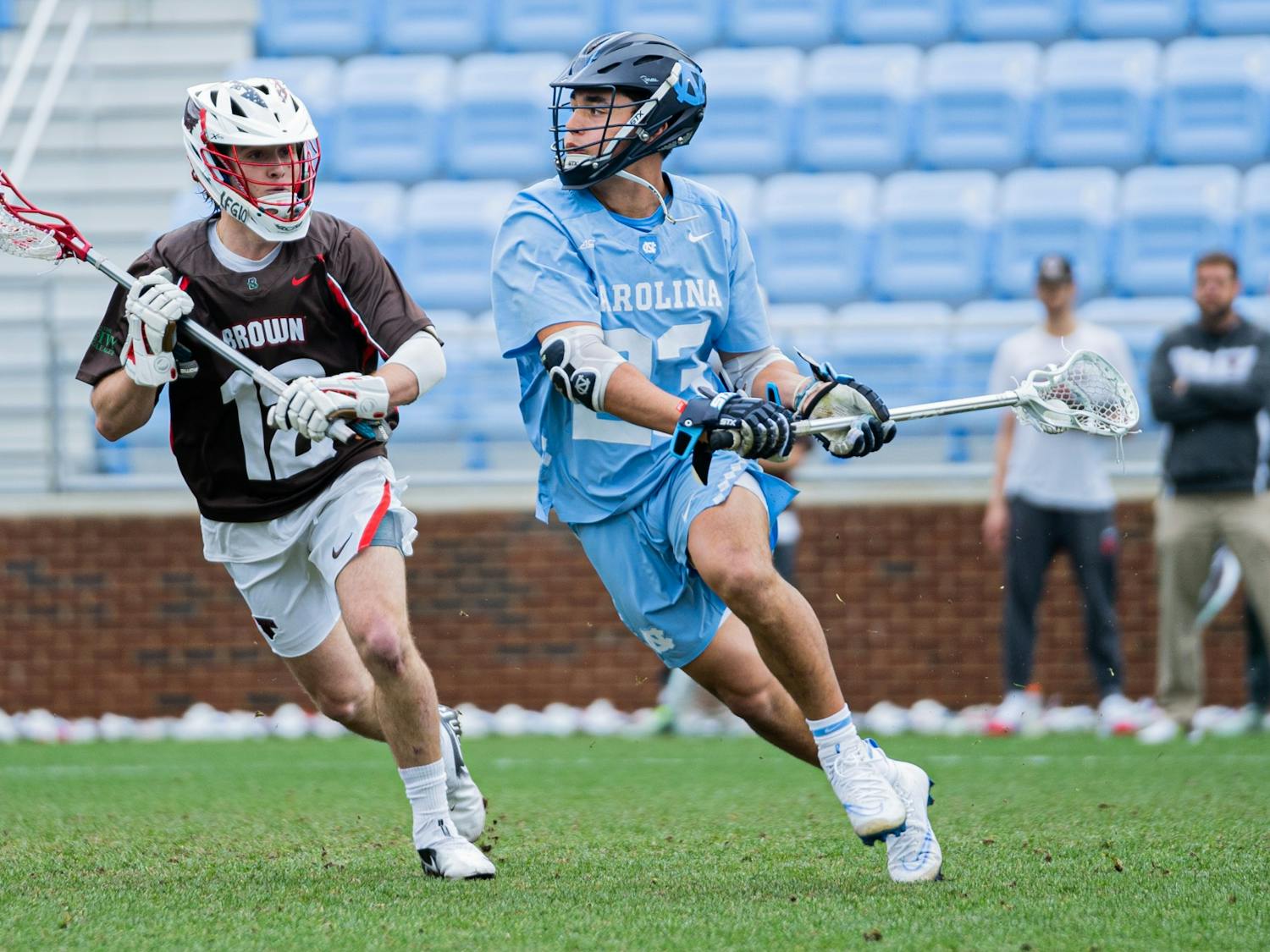 First-year midfielder Ty English (23) prepares to take a shot during a men's lacrosse game in Dorrance Stadium against Brown University on Wednesday, Feb. 23, 2022. UNC won 14-11.