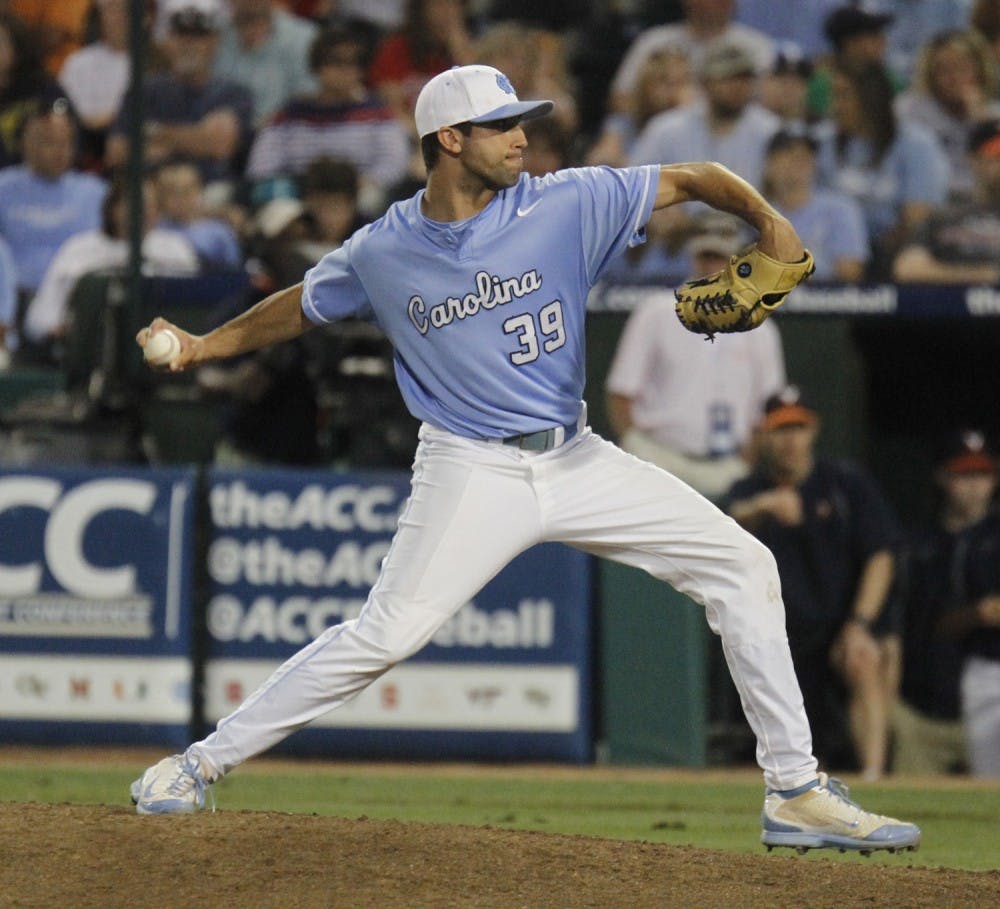 UNC junior pitcher Benton Moss (39) opened the game throwing for the Heels. UNC baseball was defeated by Virginia 3-2 Friday night in Greensboro in the ACC tournament. 