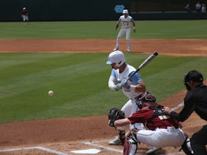 Junior Michael Busch (15) stands at bat during the Tar Heels' third baseball game against Boston College on Easter weekend, 2019.