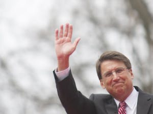 McCrory waves to the crowd after he take the oath.
